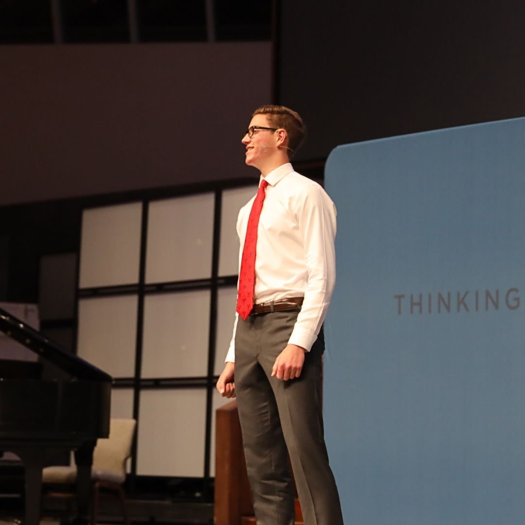 female declamations finalist presenting on stage