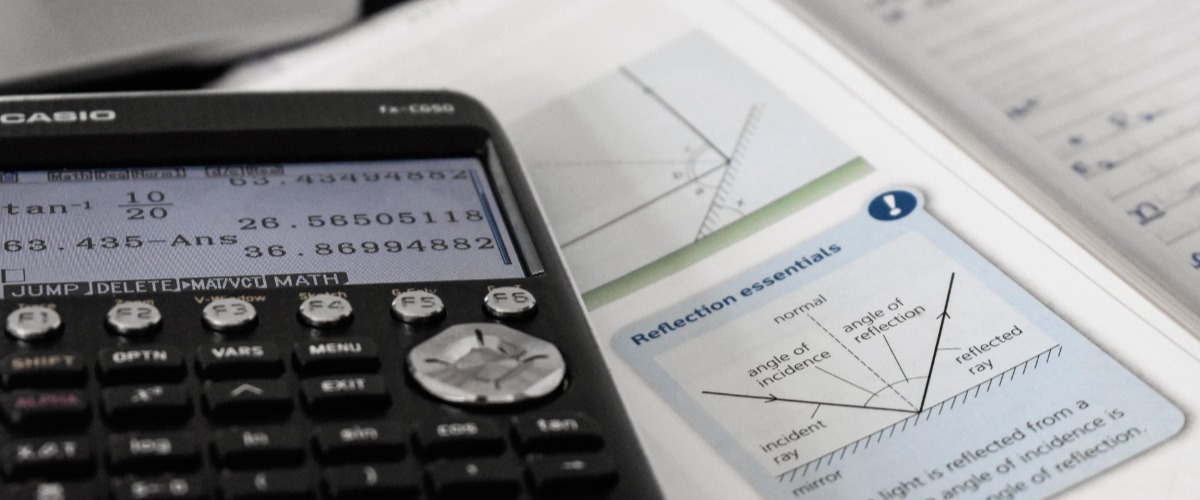teacher and student reviewing work in the academic support center