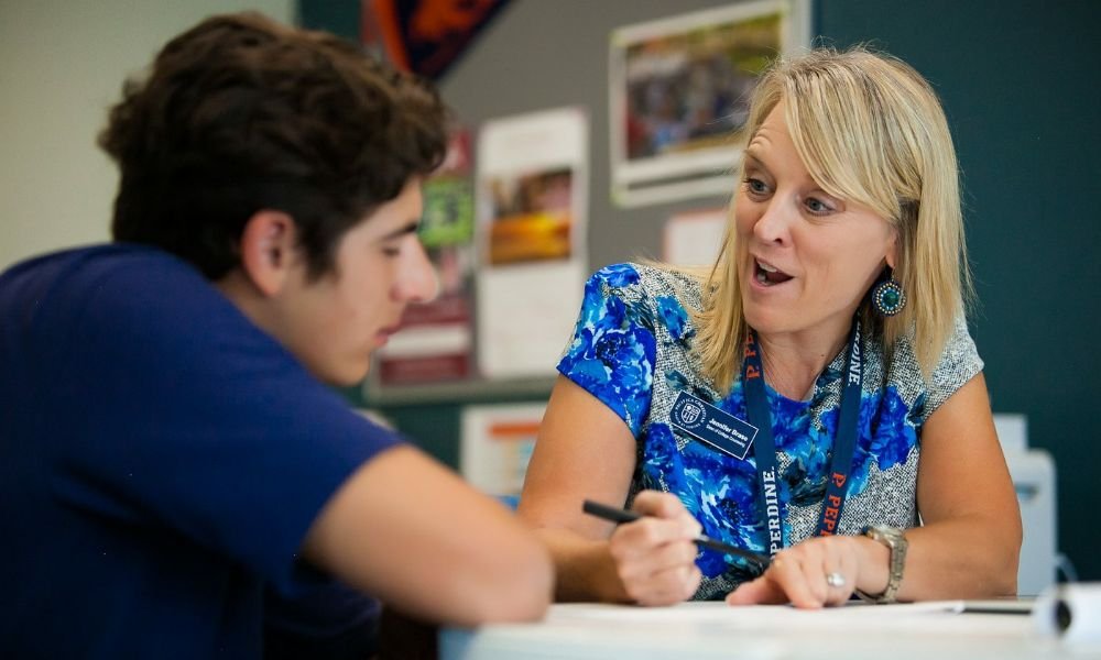 Pacifica counselor talking to student