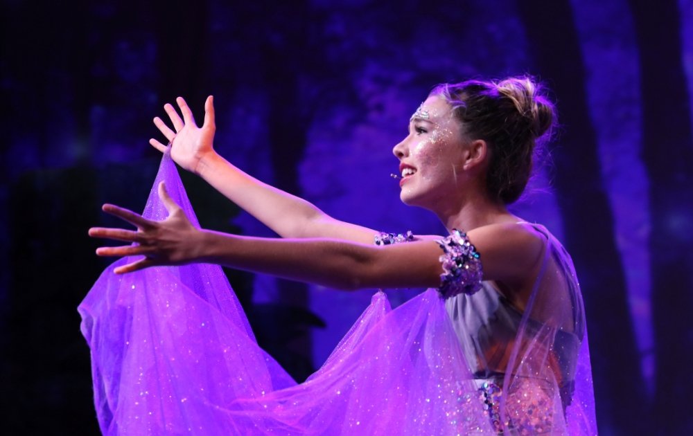 Pacifica student actress on stage