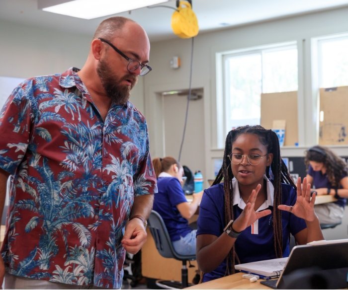 Pacifica student discussing project with teacher