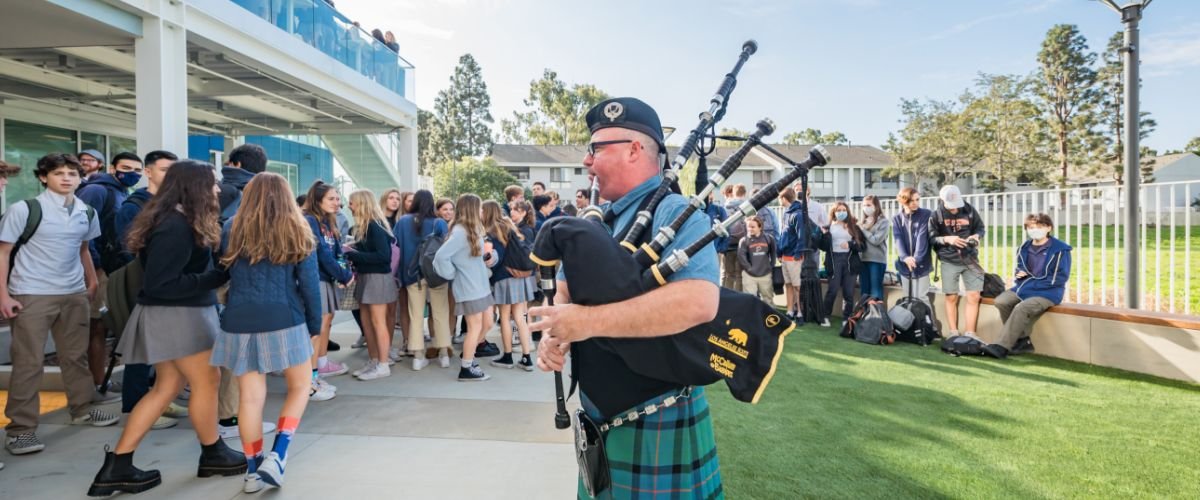 bagpipe player at first day of school celebration