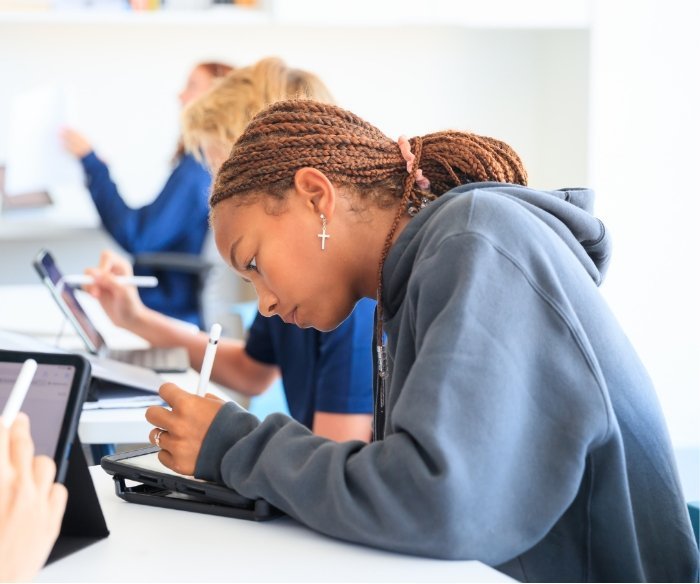 Pacifica student working on iPad