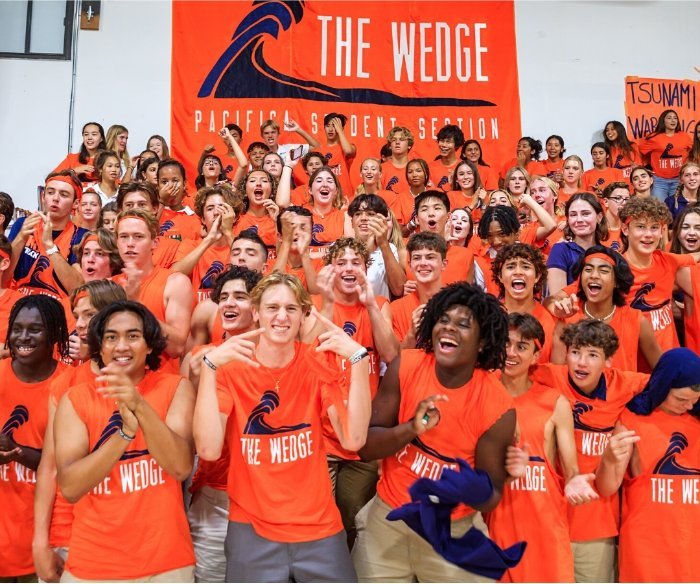 Pacifica students dressed in orange at a sporting event