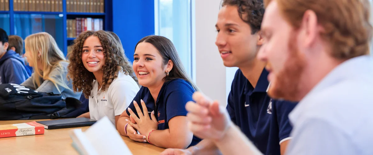 students walking on sidewalk in front of Pacifica Orange County campus